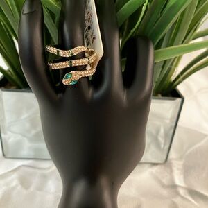 Elegant Gold plated Snake Ring with Green Accents looks very unique Elevated